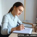 Home 19 행정관리사로 경력 전환 성공 스토리 - A professional young woman of Slavic descent sitting at a modern desk in a bright, organized home of...